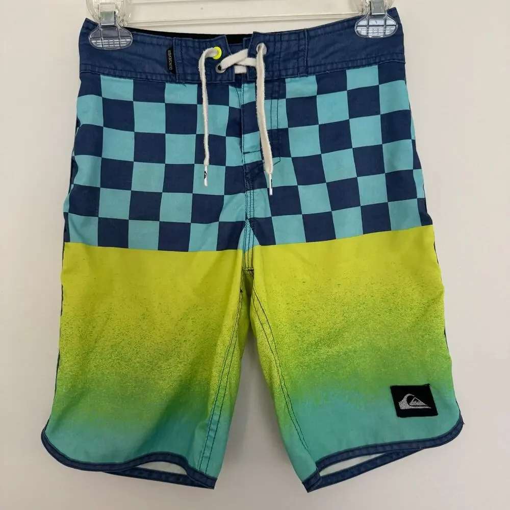 Quiksilver Board Shorts Featuring a Checkerboard Top and a Gradient Bottom